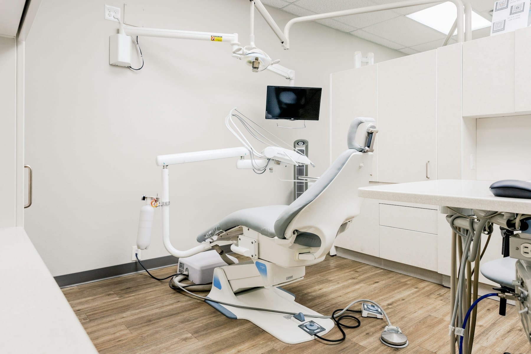 A quiet, empty dental treatment room